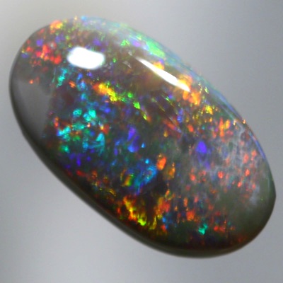 SOLID BLACK OPAL Bright sparkling fire red and copper orange